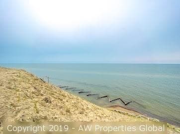 Approximately 9.4 Acre Parcel & Home on Bluff Overlooking Lake Michigan with 200′ of Private Beach, photo 13