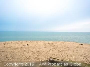 Approximately 9.4 Acre Parcel & Home on Bluff Overlooking Lake Michigan with 200′ of Private Beach, photo 8