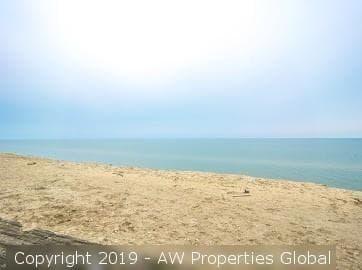 Approximately 9.4 Acre Parcel & Home on Bluff Overlooking Lake Michigan with 200′ of Private Beach, photo 9