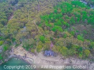 Approximately 9.4 Acre Parcel & Home on Bluff Overlooking Lake Michigan with 200′ of Private Beach, photo 16